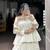 Elegant White Lehenga Choli with Vibrant Patchwork Border