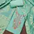 Women's turquoise jam cotton embroidered handwork unstitched dress material