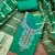 Women's green silk embroidered unstitched dress material