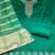 Women's green silk embroidered unstitched dress material