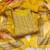 Women's yellow banarasi embroidered unstitched dress material