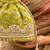 Green silk embroidered potli bag