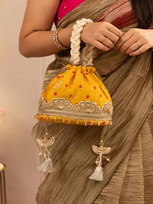 Yellow silk embroidered potli bag 2