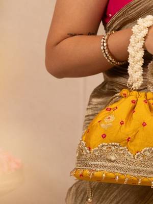 Yellow silk embroidered potli bag 3