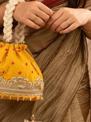 Yellow silk embroidered potli bag 4