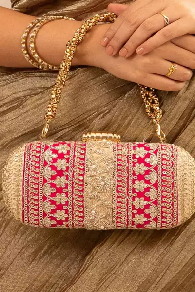 Pink silk embroidered clutch