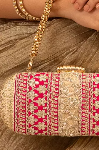 Pink silk embroidered clutch
