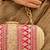 Pink silk embroidered clutch