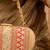 Red silk embroidered clutch