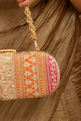 Orange silk embroidered clutch