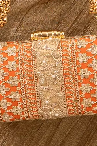 Orange silk embroidered clutch