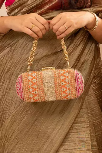Orange silk embroidered clutch