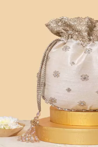 Beige silk embroidered potli bag