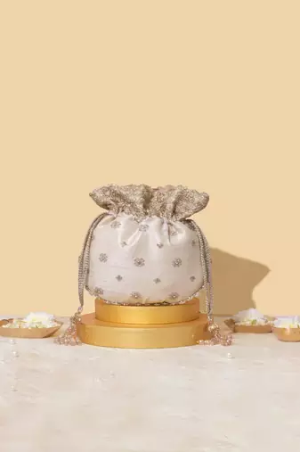 Beige silk embroidered potli bag