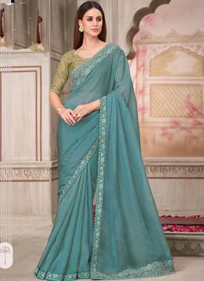 teal green embroidered saree 1