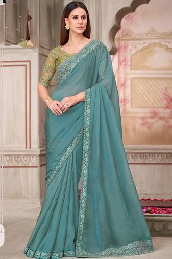 teal green embroidered saree