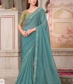 teal green embroidered saree