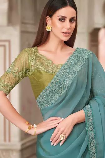 teal green embroidered saree