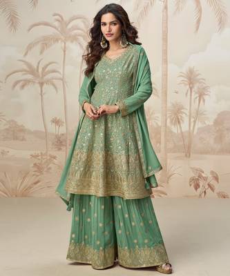 Pastel green geogette full stitched suit upto 42 1