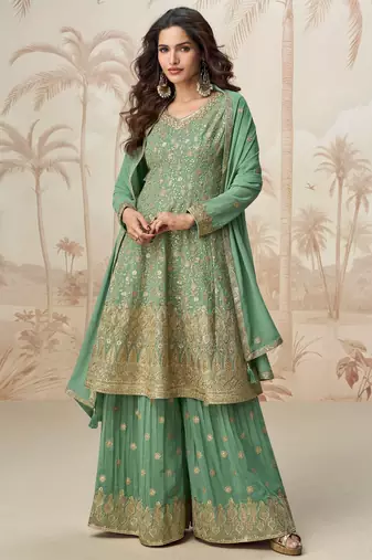 Pastel green geogette full stitched suit upto 42