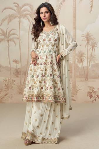 Cream geogette full stitched suit upto 42