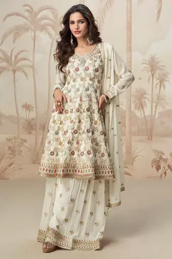 Cream geogette full stitched suit upto 42