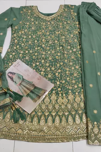 Pastel green geogette full stitched suit upto 42