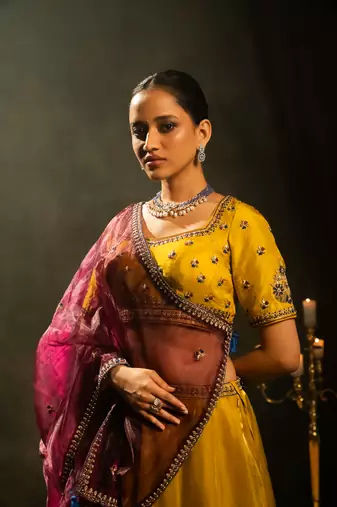 yellow embroidered tissue Lehenga