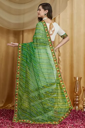 Riva enterprise women's designer kutchi embroidery georgette saree with blouse