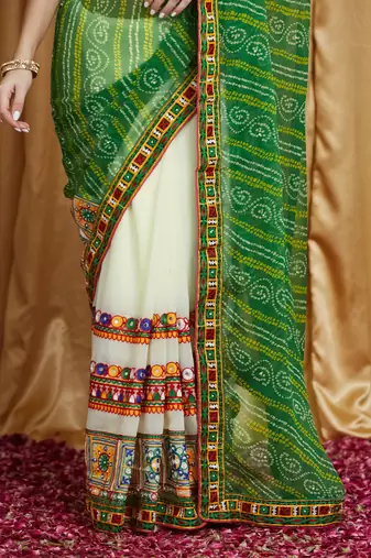 Riva enterprise women's designer kutchi embroidery georgette saree with blouse