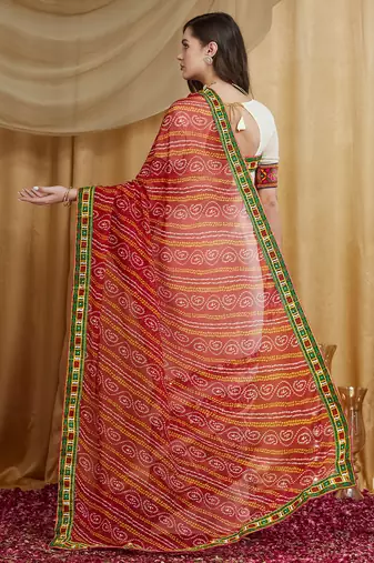Riva enterprise women's designer kutchi embroidery georgette saree with blouse