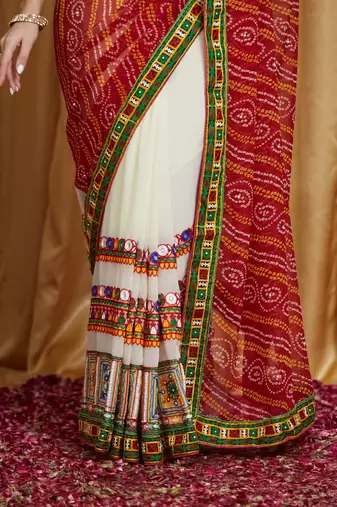 Riva enterprise women's designer kutchi embroidery georgette saree with blouse
