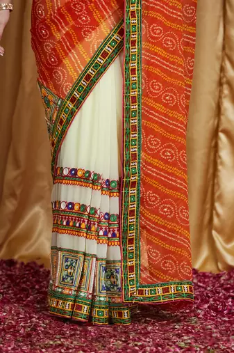Riva enterprise women's designer kutchi embroidery georgette saree with blouse