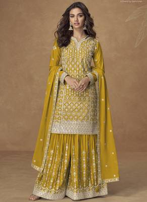 Yellow chinon silk embroidered sharara suit 1