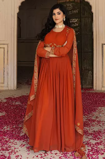 Elegant rust georgette gown with embroidered dupatta for festive occasions