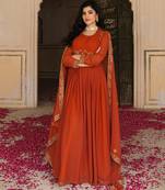 Elegant rust georgette gown with embroidered dupatta for festive occasions