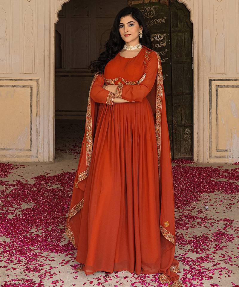 Elegant rust georgette gown with embroidered dupatta for festive occasions