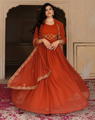 Elegant rust georgette gown with embroidered dupatta for festive occasions 2