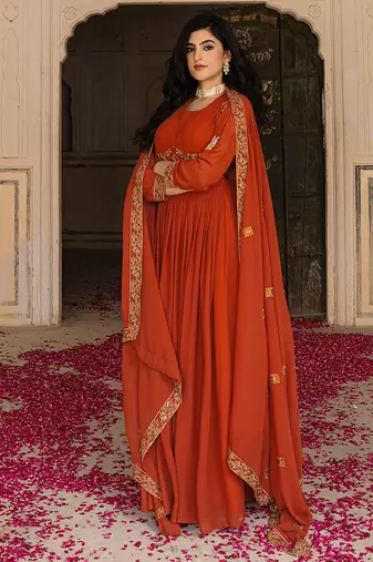 Elegant rust georgette gown with embroidered dupatta for festive occasions