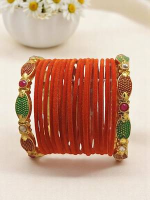 Set of 18 orange and gold plated velvet bangle set 1