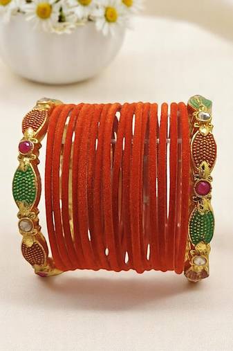 Set of 18 orange and gold plated velvet bangle set