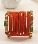 Set of 18 orange and gold plated velvet bangle set