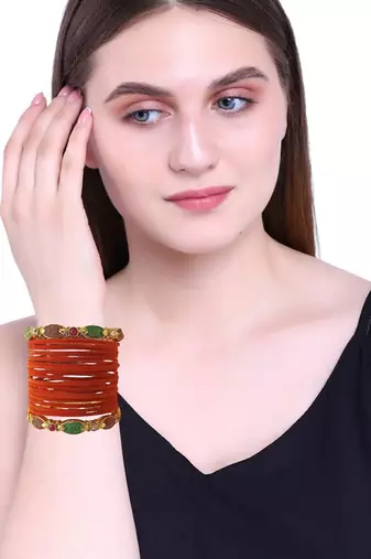 Set of 18 orange and gold plated velvet bangle set