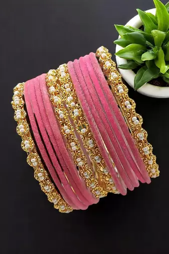 Set of 12 pink and gold plated velvet bangle set