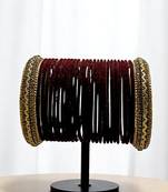 Set of 26 maroon and gold plated velvet bangle set