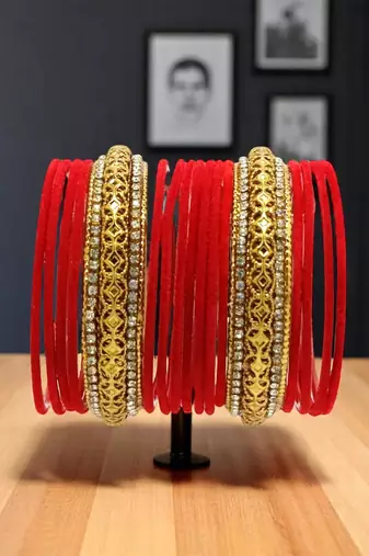 Set of 16 red and gold plated velvet bangle set