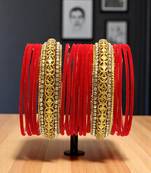 Set of 16 red and gold plated velvet bangle set