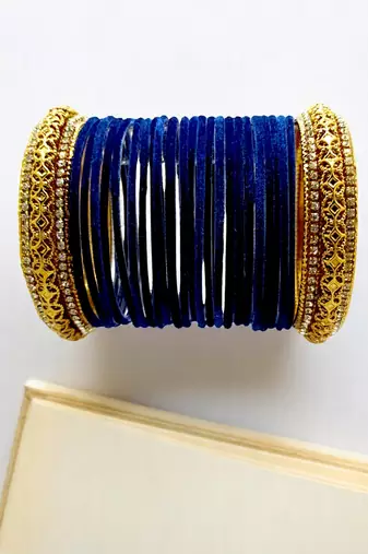 Set of 24 navy blue and gold plated velvet bangle set
