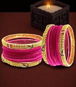 Set of 28 rani and gold plated velvet bangle set