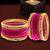 Set of 28 rani and gold plated velvet bangle set